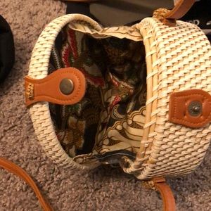 Mini never used rattan round crossbody